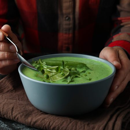 Concept of tasty eating with pea soup